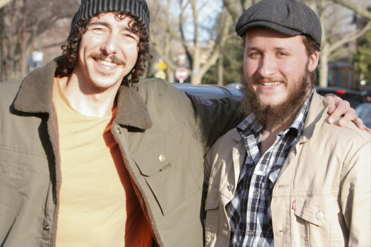 A picture of two friends who own a chicagoland based auto detailing and headlight restoration business.